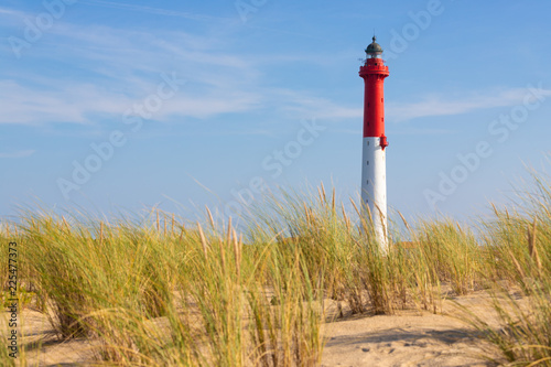Tall lighthouse in the dunes