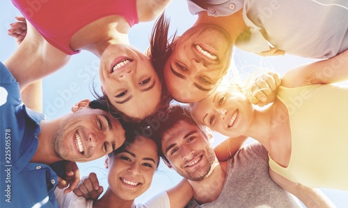 Group of happy young people in circle