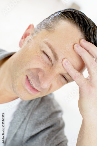 man with severe headache
