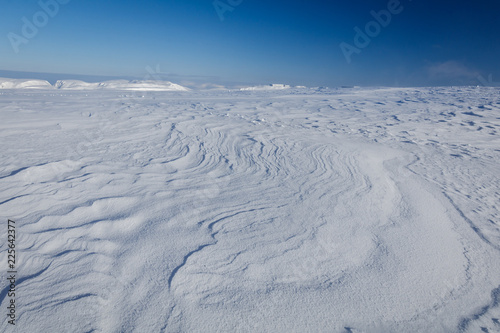 Snow plain on top of the mountain, Murmansk region, Russia