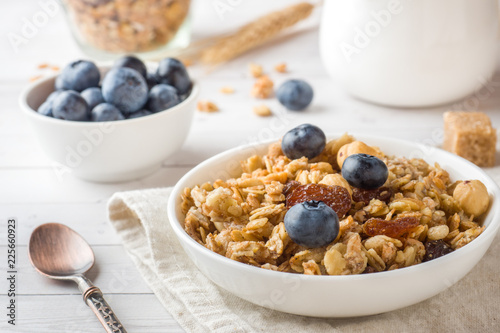 Oat flakes, granules and nuts muesli with blueberries. The concept of healthy food, Breakfast.
