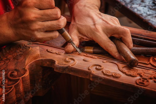 Carving and polishing of mahogany furniture