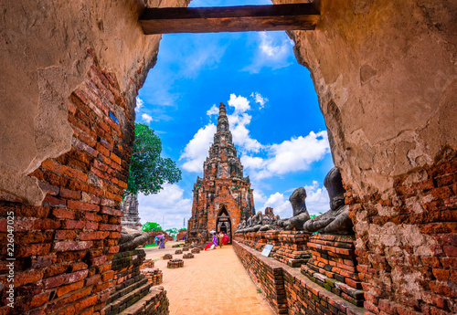 Tourists visit the ancient temple Wat Chaiwatthanaram located at Ayutthaya, Thailand.