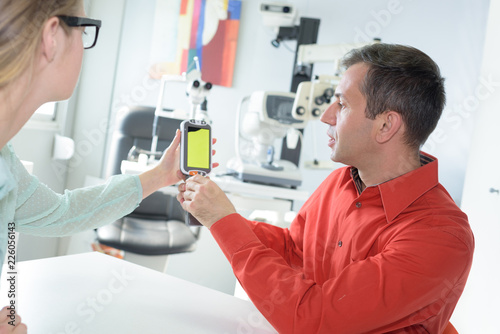 female doctor examining patient