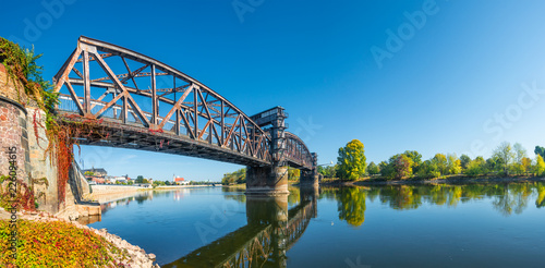 Old Town Railway Bridge in Magdeburg, Elbe river and downtown at Autumn