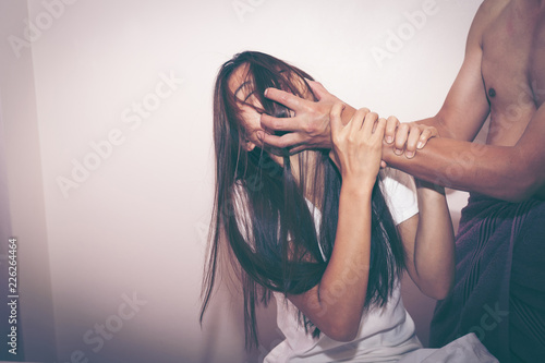 The dark, moody image is a concept of a woman being abused, raped, beaten, threatened, robbed, domestic violence etc.