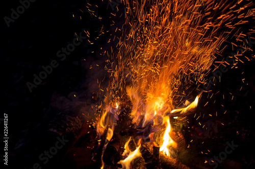 Beautiful bonfire with sparks flying upwards 