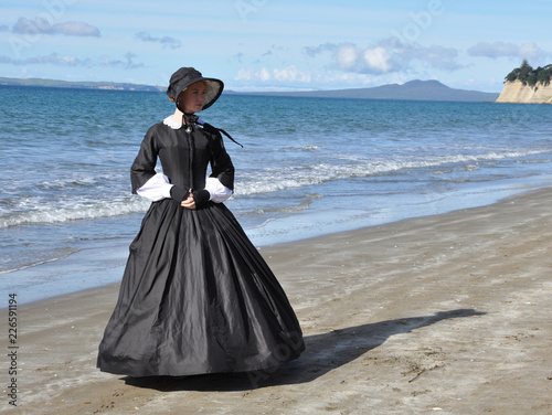 Victorian woman on beach