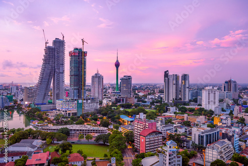 Colombo Sri Lanka skyline cityscape photo. Sunset in Colombo with views over the biggest city in Sri Lanka island. Urban views of buildings and the Laccadive Sea 