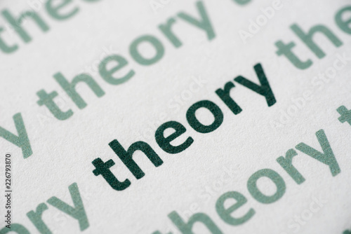 word theory printed on paper macro