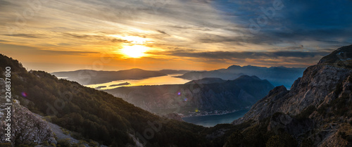 Panorama of Mediterranean Sea surrounded by mountains at colorful sunset