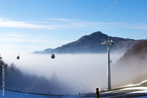 Cable Car in the foggy winter morning over the Alps Weissenstein mountain, Solothurn, Switzerland