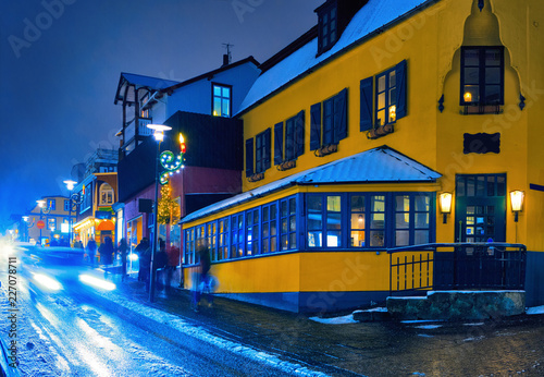 Laugavegur street during a snowstorm in the late evening, Reykjavik, Iceland.