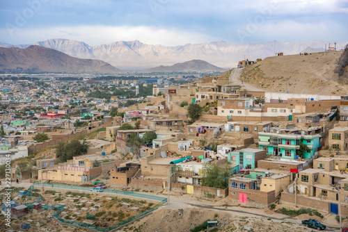 Kabul Afghanistan city scape skyline, mosque and Kabul hills mountains with houses and buildings