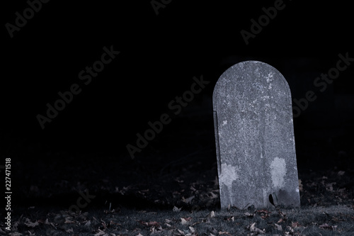 Graveyard Tombstone in Darkness