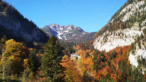 europe panorama view park landscape alps mountains blue sy background spring forest white snow stock photo
