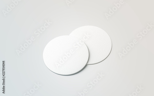 Blank white two beer coasters mockup set, isolated, 3d rendering. Blank round rug for beverage mock up. Empty bottle coaster lying. Circular can mat design.