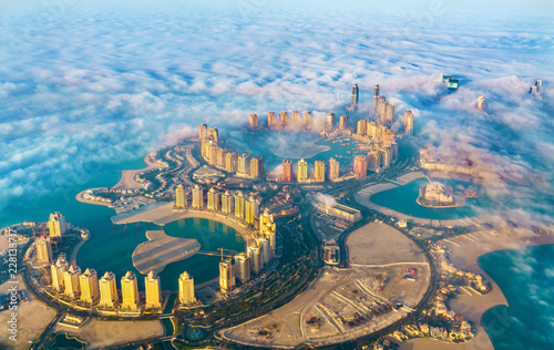 Aerial view of the Pearl-Qatar island in Doha through the morning fog - Qatar, the Persian Gulf