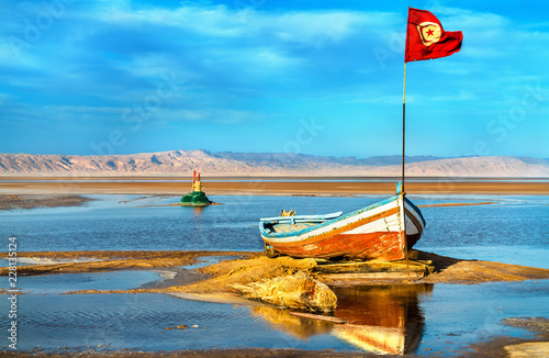 Boat on Chott el Djerid, a dry lake in Tunisia