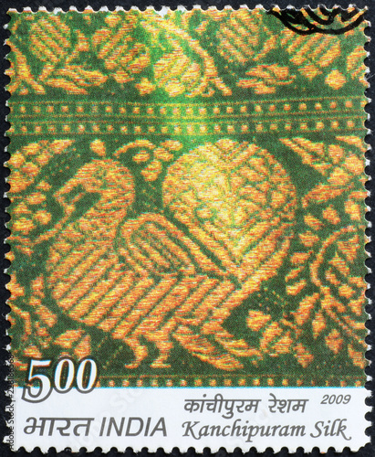 Elaborate indian fabric on postage stamp