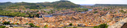 Bosa, Italy - Panoramic view of the historic town of Bosa at the western coast of Sardegna by the Fiume Temo river and Bosa Marina in the background
