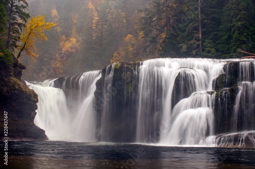 A foggy autumn morning at Lower Lewis Falls in Washington state