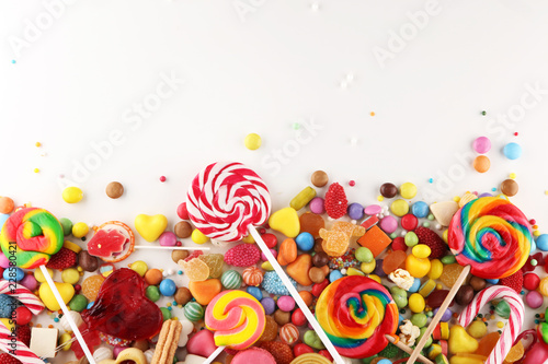 candies with jelly and sugar. colorful array of different childs sweets and treats.