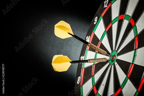 Closeup of Darts in Bullseye