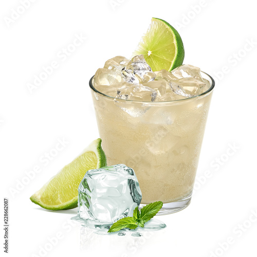 Vodka lime, gimlet or gin tonic with ice in glass on white background