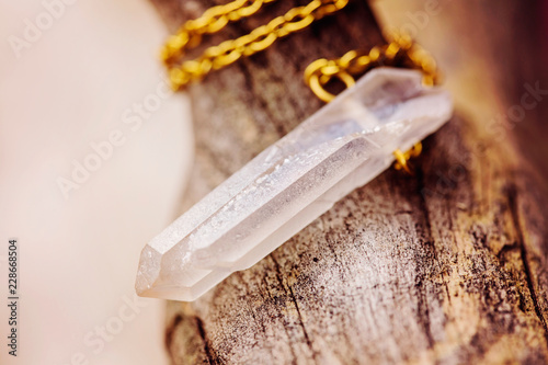Natural crystal quartz pendant on metal chain