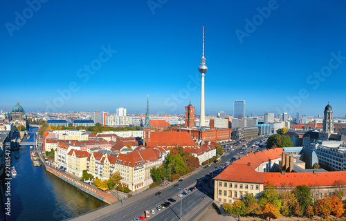 Aerial view of central Berlin on a bright day, including Red Town-Hall and television tower at Alexanderplatz