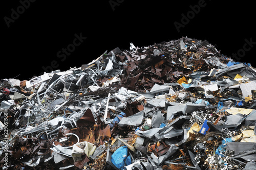 Pile of metal trash on a black background