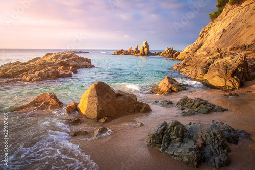 Idyllic spanish beach landscape on sunrise