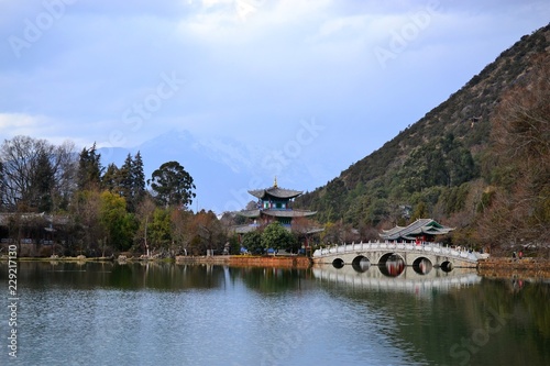 Black Dragon Pool and Jade Dragon Snow Mountain , Lijiang, Yunnan, China. Heilongtan Yulong Xueshan