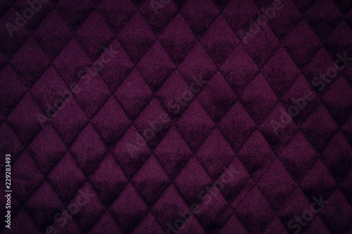 Fabric velour quilted close-up. Quilted surface upholstery