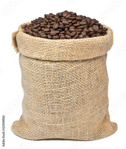 Roasted coffee beans in a burlap sack. Sackcloth bag with coffee beans, isolated on white background. Coffee export.