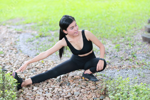young healthy and sporty woman do yoga stretching outdoor