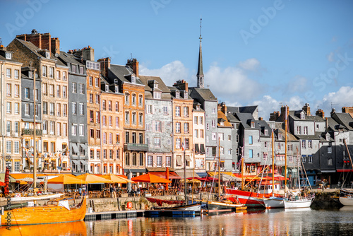Waterfront with beautiful old buildings in Honfleur, famous french town in Normandy
