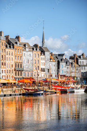 Waterfront with beautiful old buildings in Honfleur, famous french town in Normandy