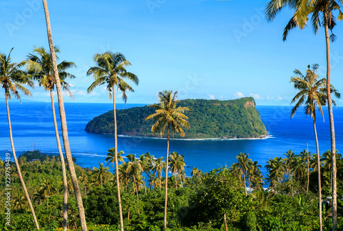 Nu'utele Island of volcanic tuff ring in deep blue waters of Pacific Ocean, scenic view from Upolu island, Samoa, Oceania