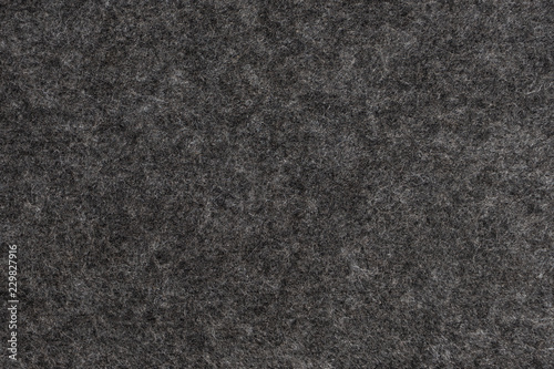 Dark Grey felt texture. Closeup view.