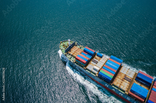 business shipping cargo containers import export and exchange fright ship open sea asia pacific international from Thailand aerial top view