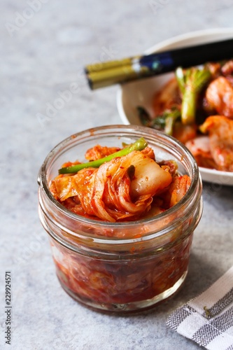 Homemade kimchi in a jar close up, selective focus