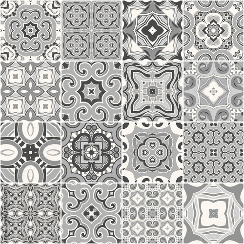 Traditional ornate portuguese decorative tiles azulejos in shades of gray