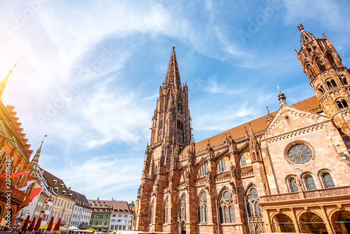 View from below on the main cathedral in the old town of Freiburg, Germany