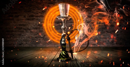 Hookah on the background with smoke, neon light, rays, sparks