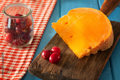 Mimolette type of cheese together with the addition fresh cranberries, 