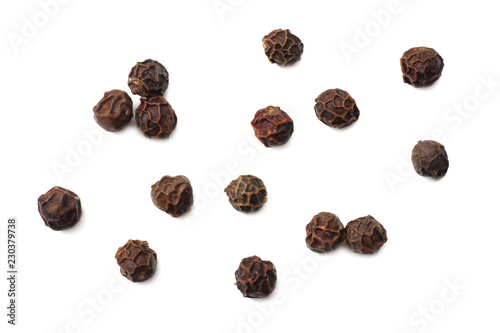 Black peppercorn isolated on white background. top view