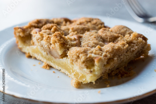Homemade Apple Crumble Cake Slice with Fork.