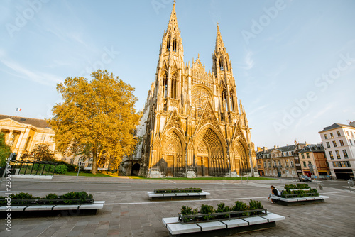 View on the gothic facade of the church of Saint-Ouen during the sunset in Rouen city, the capital of Normandy region in France